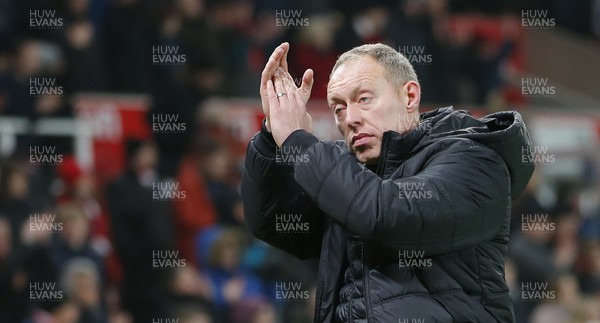 250120 - Stoke City v Swansea City - Sky Bet Championship - A weary looking Manager Steve Cooper  of Swansea applauds the Welsh fans at the end of the match   