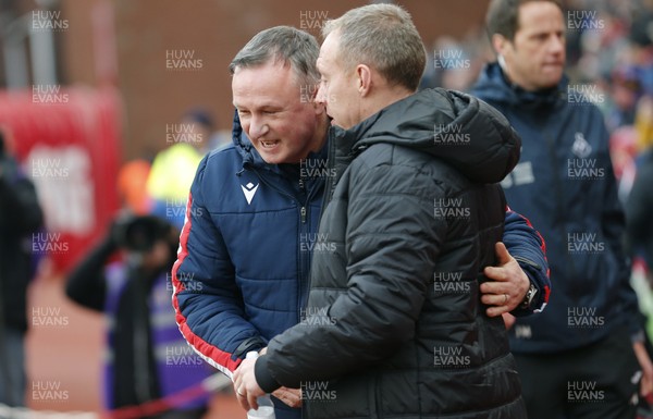 250120 - Stoke City v Swansea City - Sky Bet Championship - Manager Steve Cooper  of Swansea and Michael O'Neill of Stoke greet each other before the match   