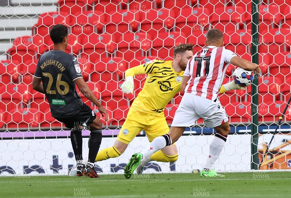 310822 - Stoke City v Swansea City - Sky Bet Championship - Goalkeeper Andy Fisher  of Swansea clears the ball from Dwight Gayle of Stoke City from an open goal