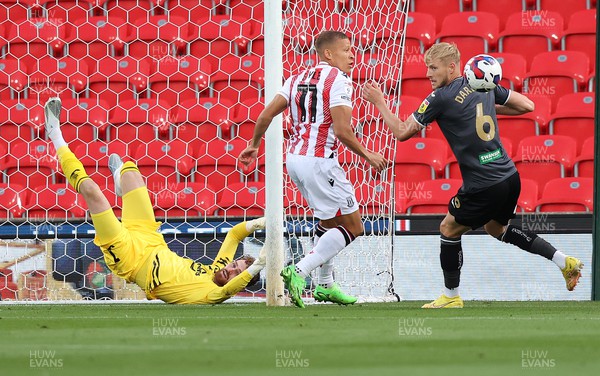 310822 - Stoke City v Swansea City - Sky Bet Championship - Goalkeeper Andy Fisher  of Swansea clears the ball from Dwight Gayle of Stoke City from an open goal