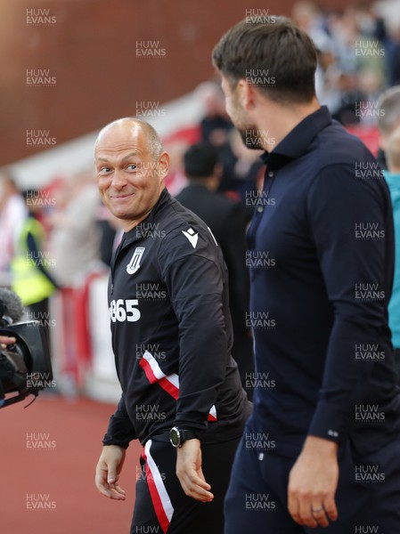 310822 - Stoke City v Swansea City - Sky Bet Championship - Stoke manager Alex Neil greets Head Coach Russell Martin  of Swansea with a wry look