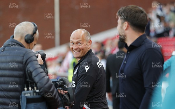 310822 - Stoke City v Swansea City - Sky Bet Championship - Stoke manager Alex Neil greets Head Coach Russell Martin  of Swansea with a wry look