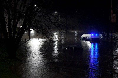 160220 - South Wales Flooding during Storm Dennis - A ambulance is surrounded by flood water in Nantgarw, South Wales