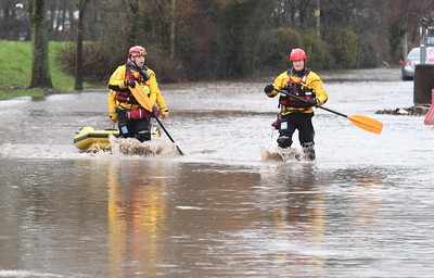 160220 - South Wales Flooding during Storm Dennis - Rescuers search flood water in Upper Boat, South Wales