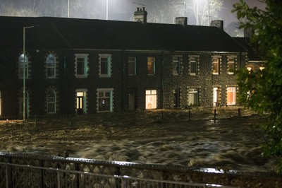 160220 - Picture shows the River Taff at Pontypridd, South Wales, Near Cardiff which has flooded its banks and peoples homes in the town