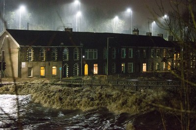 160220 - Picture shows the River Taff at Pontypridd, South Wales, Near Cardiff which has flooded its banks and peoples homes in the town