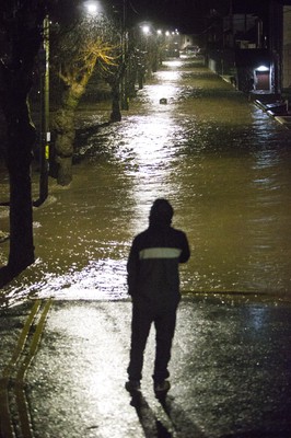 160220 - Picture shows the River Taff at Pontypridd, South Wales, Near Cardiff which has flooded its banks and peoples homes in the town