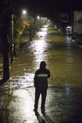 160220 - Picture shows the River Taff at Pontypridd, South Wales, Near Cardiff which has flooded its banks and peoples homes in the town