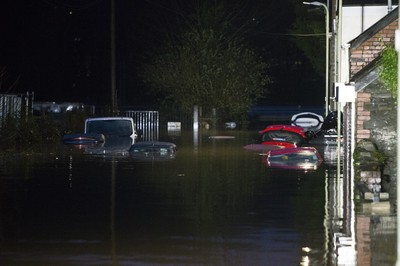 160220 - Picture shows the River Taff at Pontypridd, South Wales, Near Cardiff which has flooded peoples homes as Storm Dennis hits the region