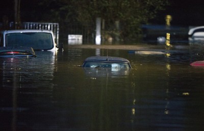 160220 - Picture shows the River Taff at Pontypridd, South Wales, Near Cardiff which has flooded peoples homes as Storm Dennis hits the region