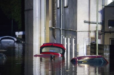 160220 - Picture shows the River Taff at Pontypridd, South Wales, Near Cardiff which has flooded peoples homes as Storm Dennis hits the region