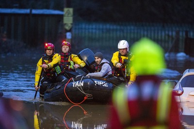 160220 - Picture shows people being rescued from Egypt Street, Pontypridd, Near Cardiff which has flooded in nearby streets and homes