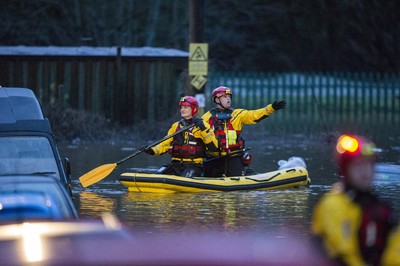 160220 - Picture shows people being rescued from Egypt Street, Pontypridd, Near Cardiff which has flooded in nearby streets and homes