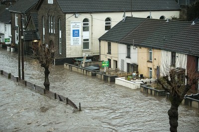 160220 - Picture shows the River Taff at Pontypridd, South Wales, Near Cardiff which has flooded peoples homes as Storm Dennis hits the region