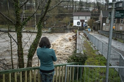 160220 - Picture shows the River Taff at Pontypridd, South Wales, Near Cardiff which has flooded peoples homes as Storm Dennis hits the region