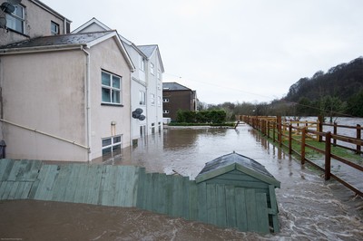 160220 - Flooding hits homes in Taffs Well north of Cardiff in south Wales as the River Taff bursts it's banks from the effects of storm Dennis