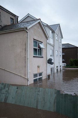 160220 - Flooding hits homes in Taffs Well north of Cardiff in south Wales as the River Taff bursts it's banks from the effects of storm Dennis