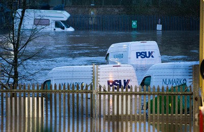 160220 -  Vehicles are submerged at the Royal Mail sorting office and other industrial units at Taffs Well north of Cardiff in south Wales are flooded as the River Taff bursts it's banks from the effects of storm Dennis