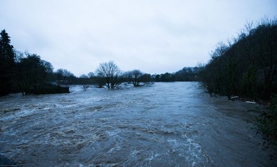 160220 -  The River Taff at Taffs Well north of Cardiff in south Wales bursts it's banks from the effects of storm Dennis