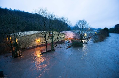 160220 - The Royal Mail sorting office and other industrial units at Taffs Well north of Cardiff in south Wales are flooded as the River Taff bursts it's banks from the effects of storm Dennis