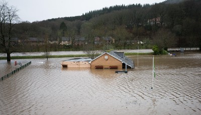 160220 -  The nursery and bowls club alongside the River Taff at Taffs Well north of Cardiff in south Wales are submerged as the the river bursts it's banks from the effects of storm Dennis