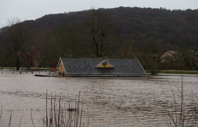 160220 -  The nursery and bowls club alongside the River Taff at Taffs Well north of Cardiff in south Wales are submerged as the the river bursts it's banks from the effects of storm Dennis