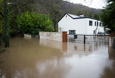 160220 -  Homes alongside the River Taff at Taffs Well north of Cardiff in south Wales are submerged as the the river bursts it's banks from the effects of storm Dennis