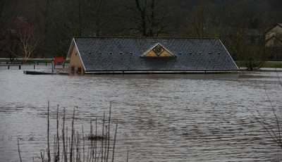 160220 -  The nursery and bowls club alongside the River Taff at Taffs Well north of Cardiff in south Wales are submerged as the the river bursts it's banks from the effects of storm Dennis