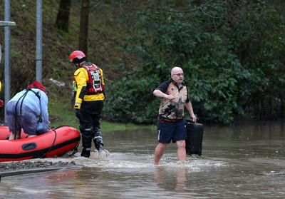 160220 -  Emergency services rescue residents and their pets from flooding caused by Storm Dennis in Treforest, South Wales