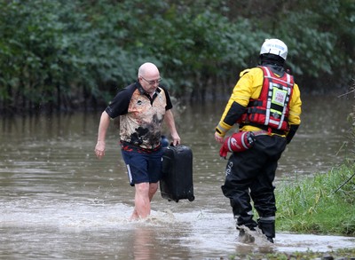 160220 -  Emergency services rescue residents and their pets from flooding caused by Storm Dennis in Treforest, South Wales