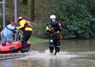 160220 -  Emergency services rescue residents and their pets from flooding caused by Storm Dennis in Treforest, South Wales