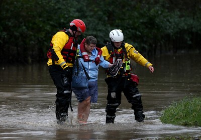 160220 -  Emergency services rescue residents and their pets from flooding caused by Storm Dennis in Treforest, South Wales