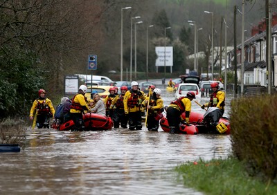 160220 -  Emergency services rescue residents and their pets from flooding caused by Storm Dennis in Treforest, South Wales