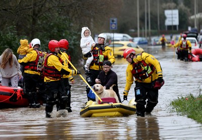 160220 -  Emergency services rescue residents and their pets from flooding caused by Storm Dennis in Treforest, South Wales