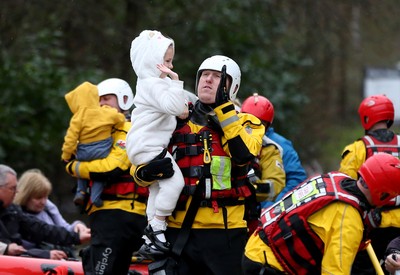 160220 -  Emergency services rescue residents and their pets from flooding caused by Storm Dennis in Treforest, South Wales