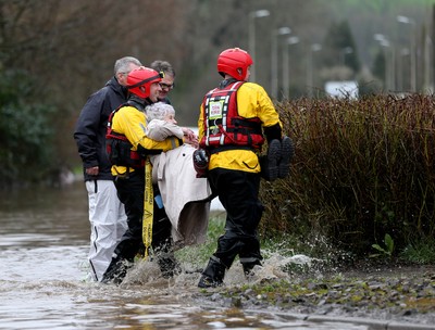 160220 -  Emergency services rescue residents and their pets from flooding caused by Storm Dennis in Treforest, South Wales