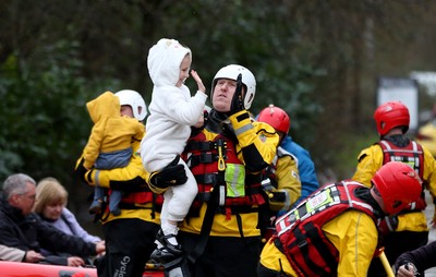 160220 -  Emergency services rescue residents and their pets from flooding caused by Storm Dennis in Treforest, South Wales