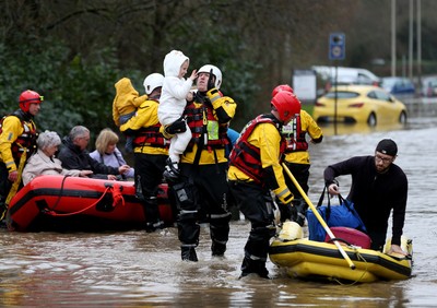 160220 -  Emergency services rescue residents and their pets from flooding caused by Storm Dennis in Treforest, South Wales