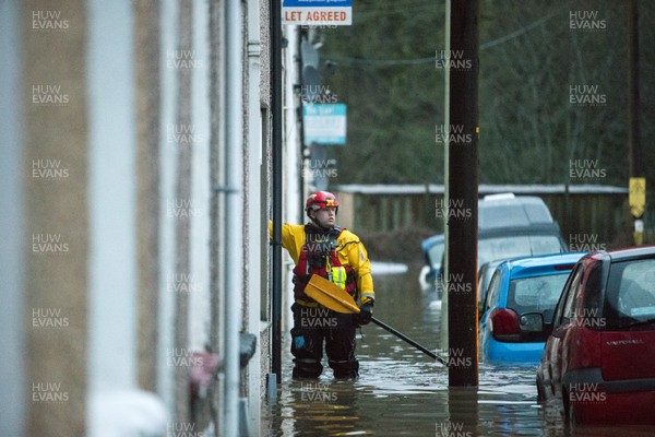 160220 - Picture shows people being rescued from Egypt Street, Pontypridd, Near Cardiff which has flooded in nearby streets and homes