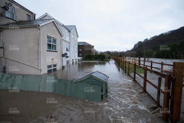 160220 - Flooding hits homes in Taffs Well north of Cardiff in south Wales as the River Taff bursts it's banks from the effects of storm Dennis