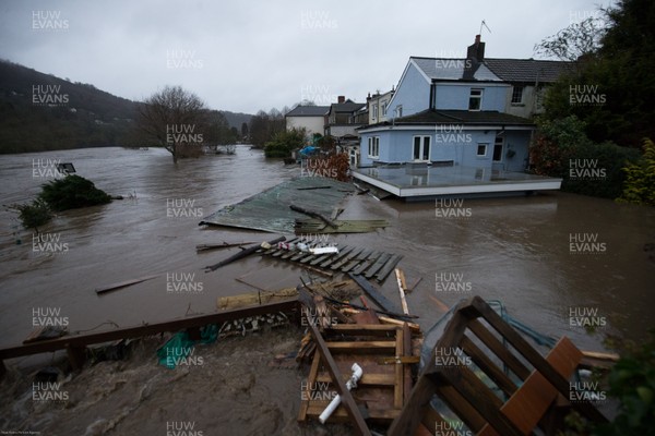160220 - Flooding hits homes in Taffs Well north of Cardiff in south Wales as the River Taff, on the left, bursts it's banks from the effects of storm Dennis