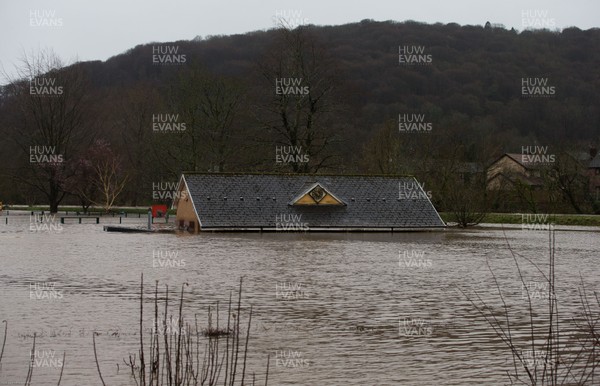 160220 -  The nursery and bowls club alongside the River Taff at Taffs Well north of Cardiff in south Wales are submerged as the the river bursts it's banks from the effects of storm Dennis