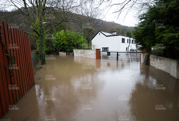 160220 -  Homes alongside the River Taff at Taffs Well north of Cardiff in south Wales are submerged as the the river bursts it's banks from the effects of storm Dennis