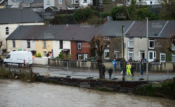 160220 -  Residents on Sion Street in Pontypridd begin to clear up after their homes were flooded after the River Taff bursts it's banks from the effects of storm Dennis