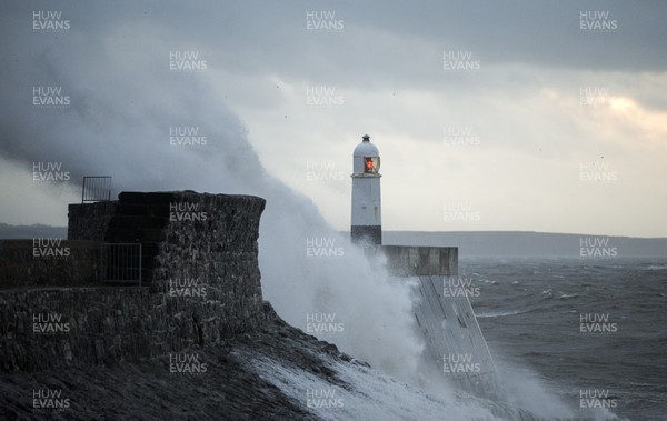 291118 - Picture shows the waves battering the lighthouse at Porthcawl as Storm Diana hits the UK