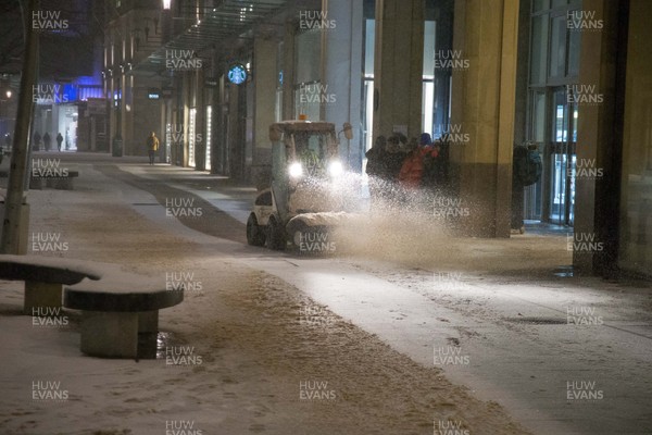010318 - Storm Emma, Cardiff - Usually busy streets in Cardiff city centre are virtually deserted in the early evening as a small snow pough clears snow from pedestrian areas at The Hayes while storm Emma hits south Wales and the South West