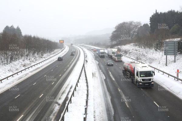 010318 - Storm Emma South Wales - The M4 near Cardiff remains open with drivers taking extra care in the wintry conditions    