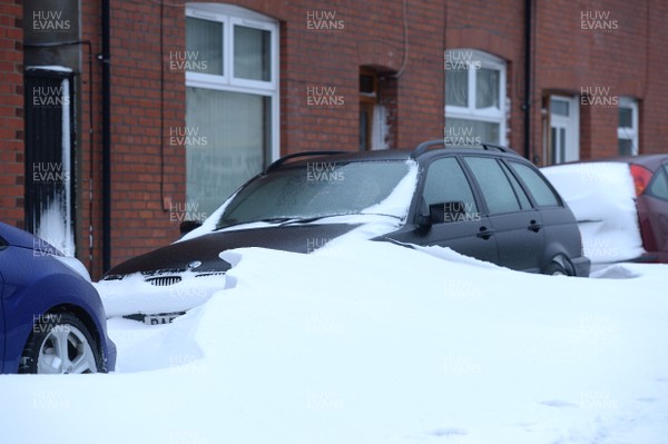 020318 - Weather - Cars surrounded by deep snow in Penarth near Cardiff, South Wales after being hit by Storm Emma