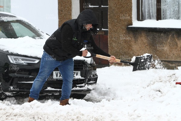 020318 - Storm Emma South Wales - Residents in Llandaff North struggle through the snow as storm Emma takes hold