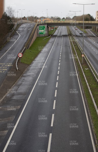 180222 - Storm Eunice, south Wales - Roads that are usually extremely busy into the centre of Cardiff are virtually deserted as people heed warnings not to travel while Storm Eunice hits south Wales and southern England